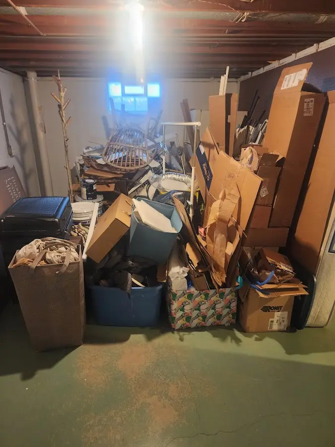 Roll-off dumpster container at job site for 2 Yard Dumpster Rental in Rockton